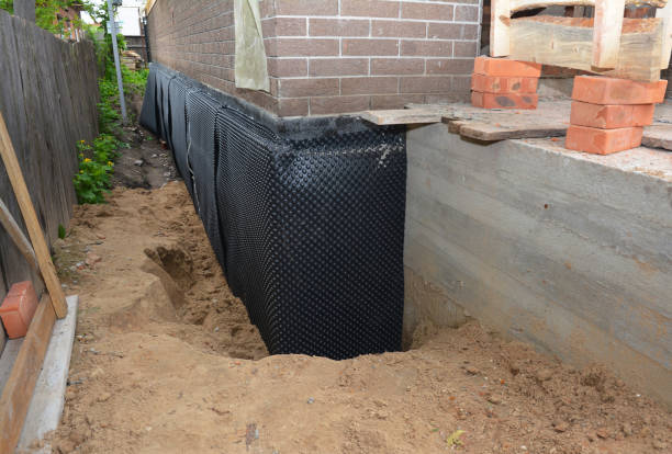 SJ Waterproofing Pros technician performing targeted Crawl Space Encapsulation assessment in Mcbrides, MI